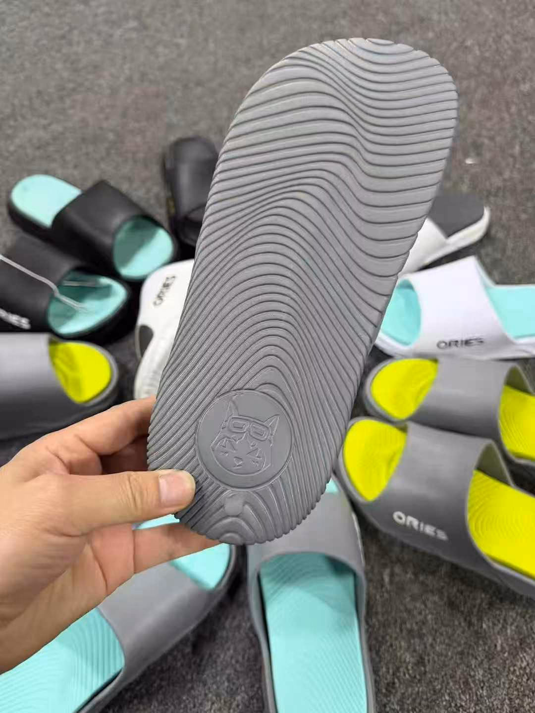 Side and back perspective of adult male lightweight comfort beach slippers
