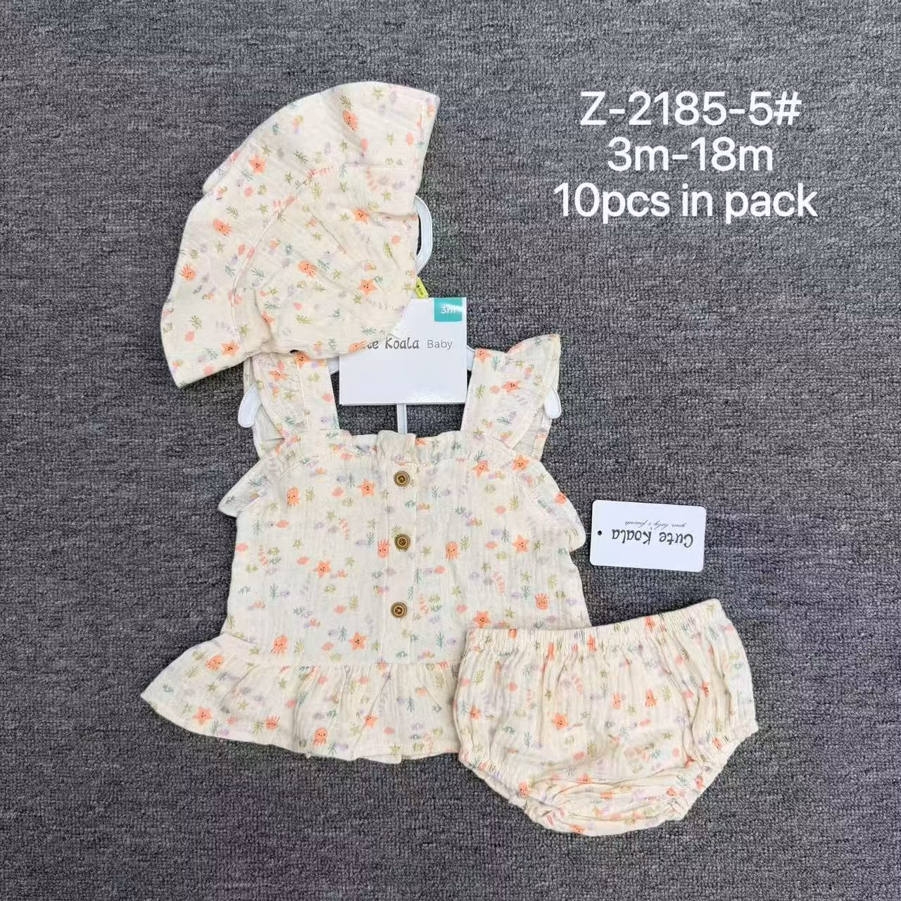 Close-up of premium double-layer cotton gauze fabric texture and delicate ruffles on baby girl summer top