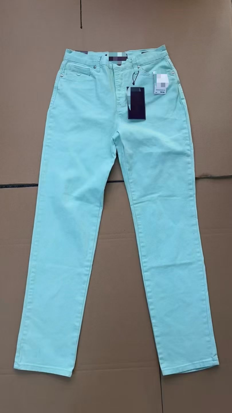 Macro close-up capturing the fine woven twill texture and flexible dynamic stretch recovery performance of the trousers